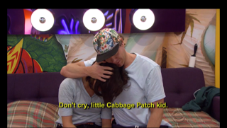 Frank consoles his cabbage patch kid