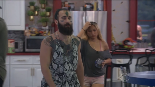 Paul dresses as a snake for the Veto ceremony