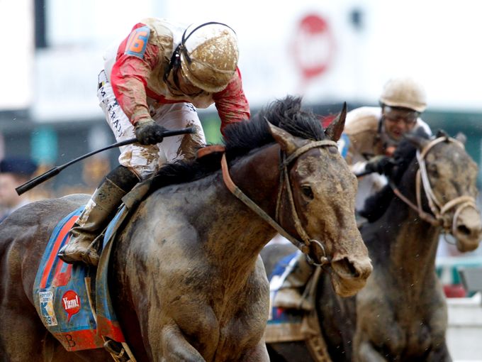 Orb in the home stretch with Revolutionary in the background